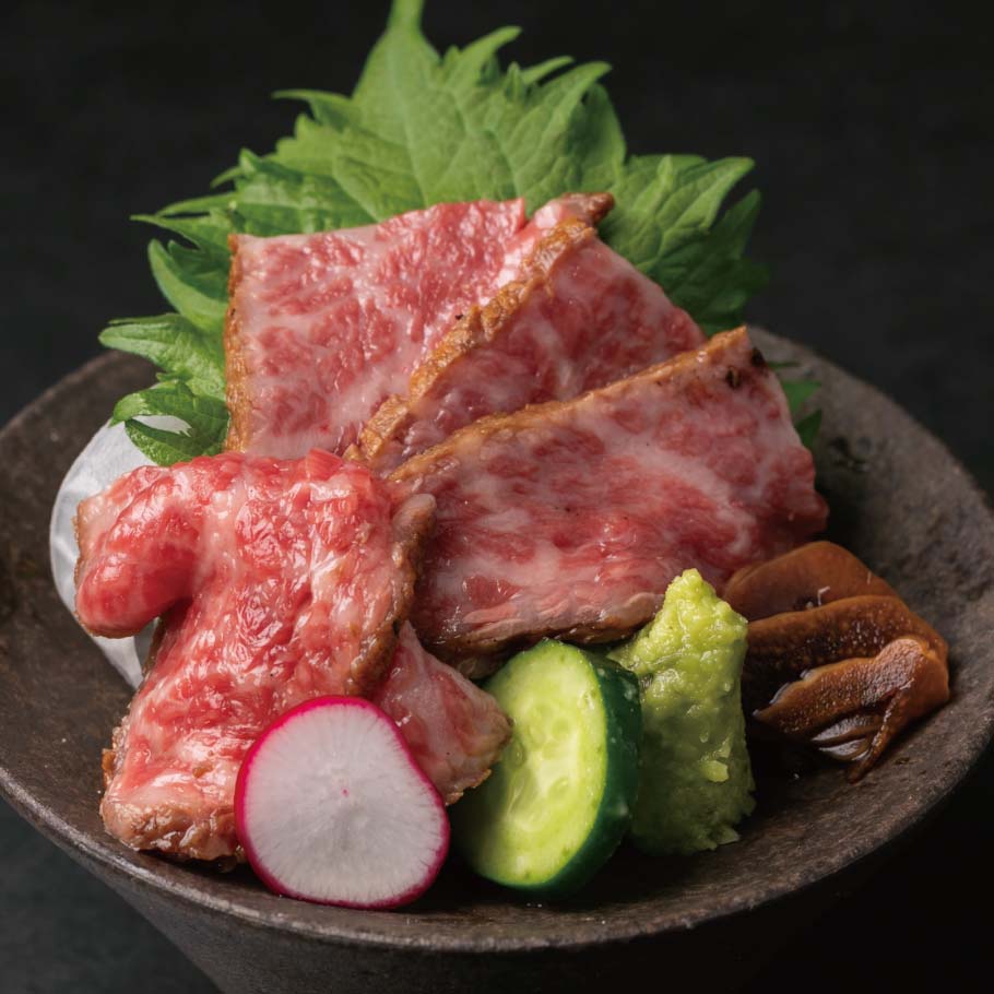 Seared Kobe beef sashimi, flame-kissed on the surface only